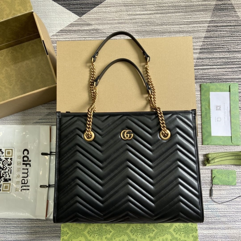 G*u*i shopping bags